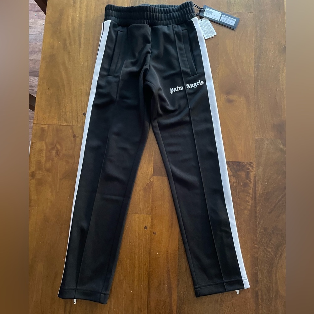 Size Xs (US Size 30) Never worn with tags to check authenticity.